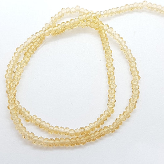 Tiny Crystal Golden Rondelle Beads Approx 200 beads