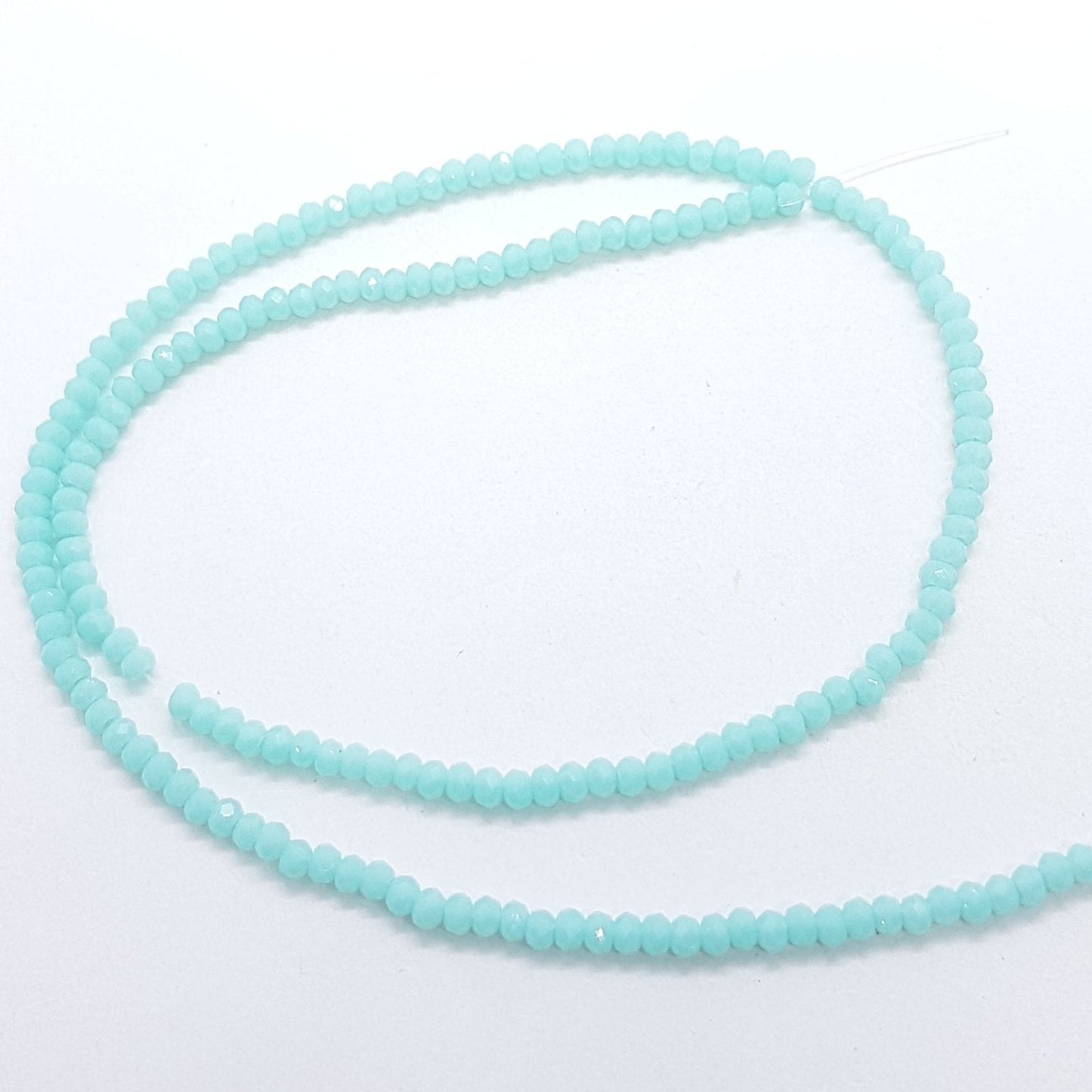 Tiny Blue Crystal Rondelle Beads Approx 200 beads