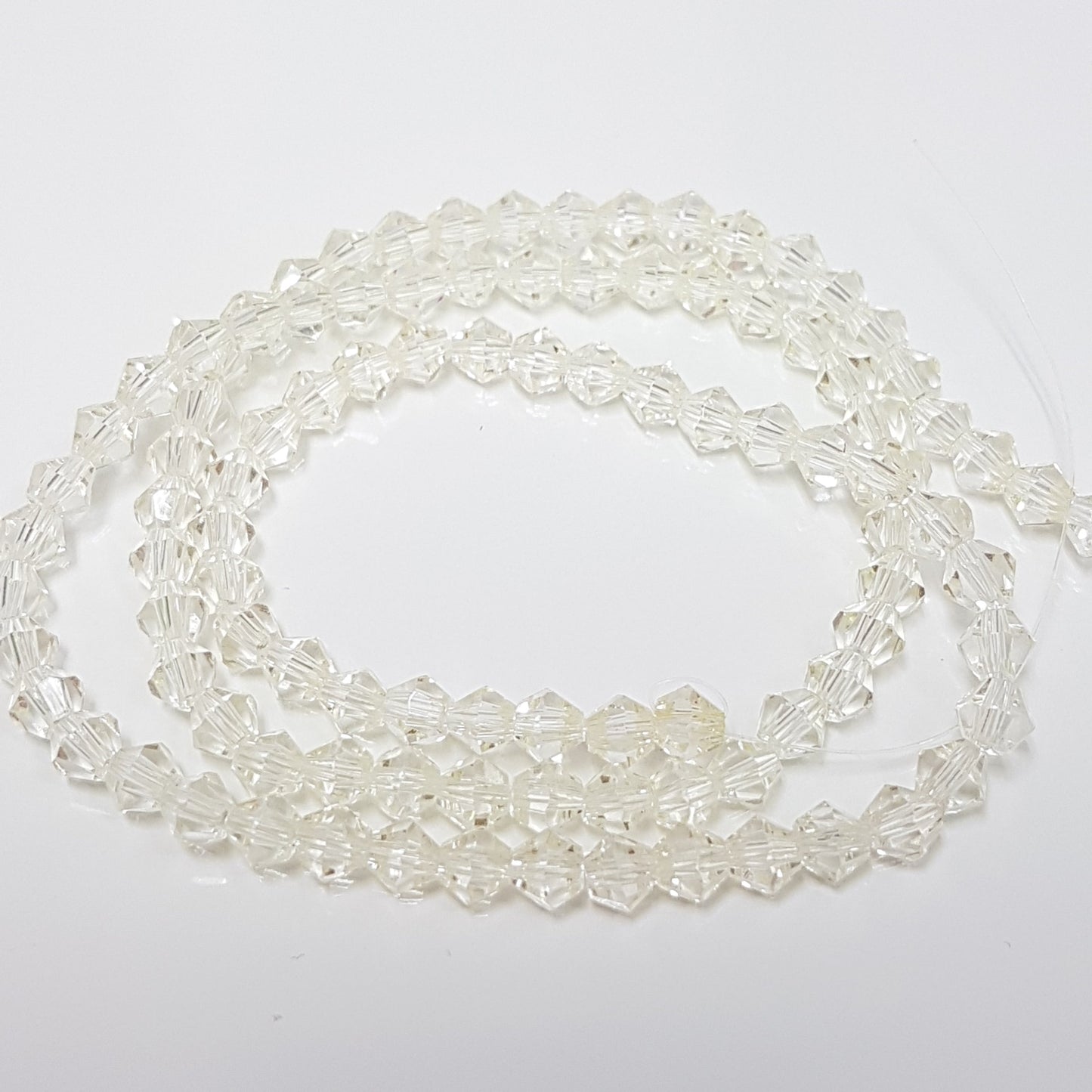 4mm Light Yellow Crystal Glass Bicones