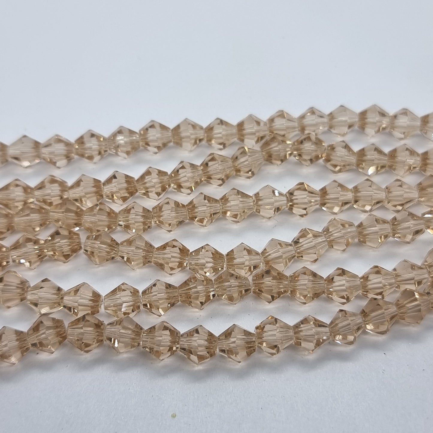 6mm Pale Peach Glass Bicones
