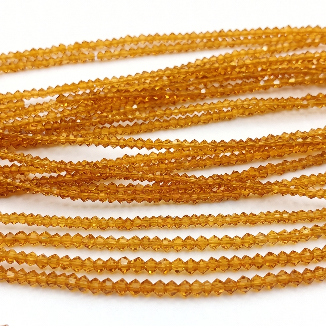 Tiny Crystal Amber Bicone Beads