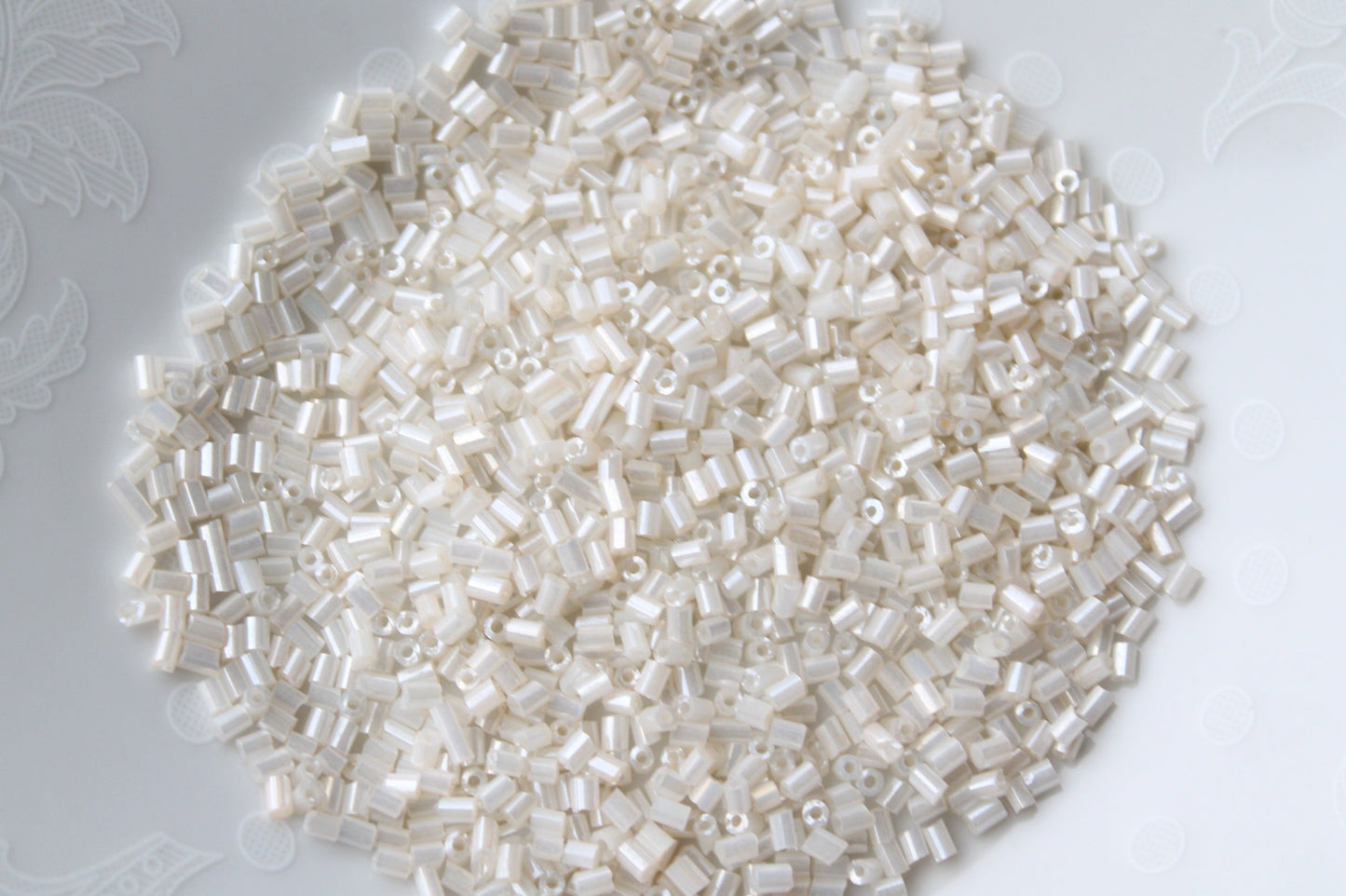 15g Two Cut Off White Seed Beads