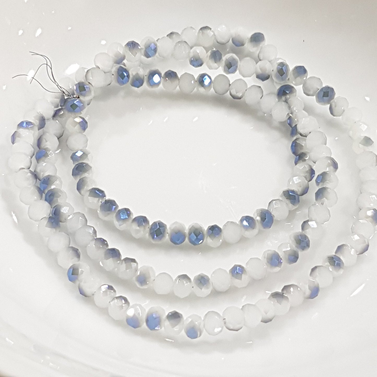 White and Blue Crystal Rondelles Approx 100 beads