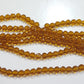 5mm Amber Faceted Glass Beads