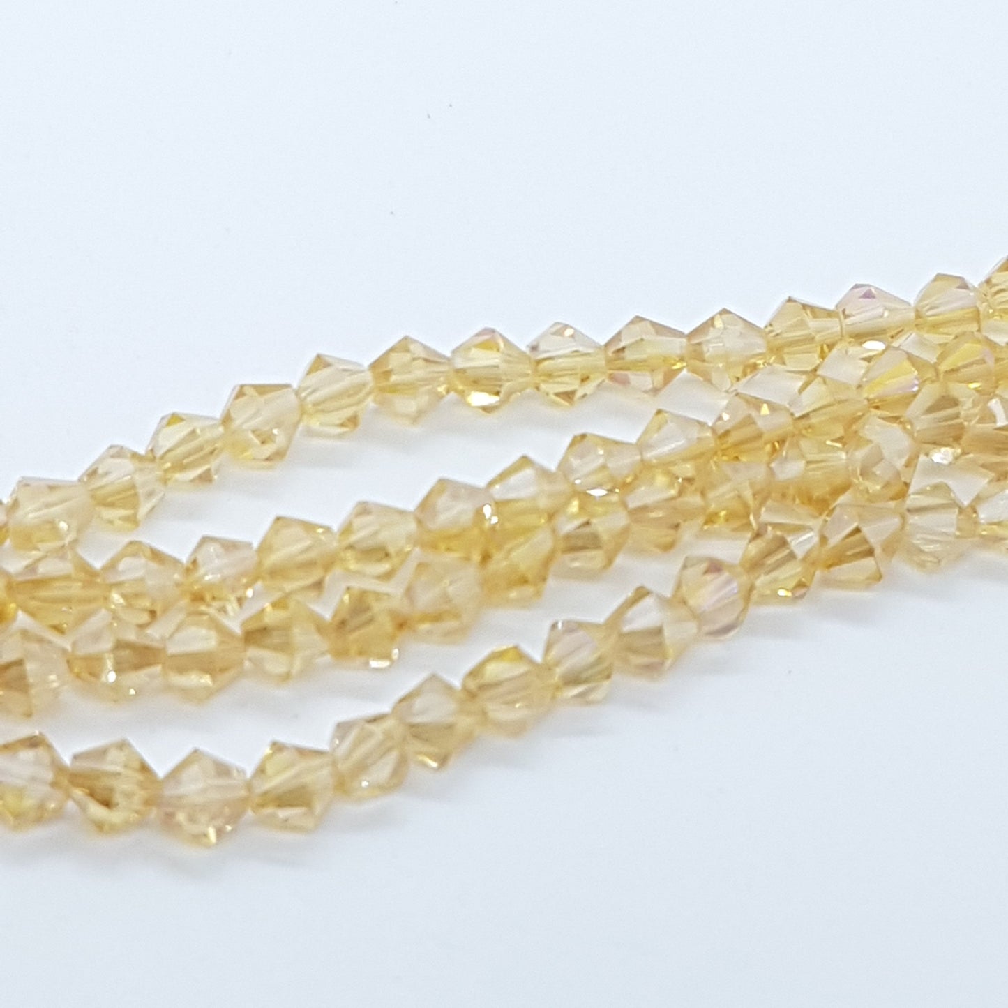 LAST 1! 4mm Light Gold Crystal Glass AB Bicones