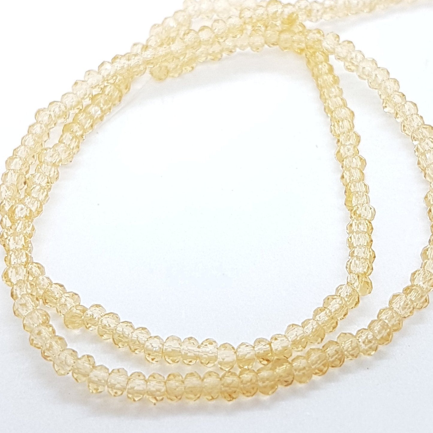 Tiny Crystal Golden Rondelle Beads Approx 200 beads