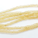 Tiny Crystal Golden Rondelle Beads Approx 200 beads