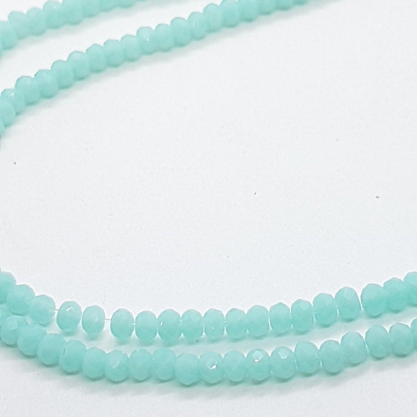 Tiny Blue Crystal Rondelle Beads Approx 200 beads