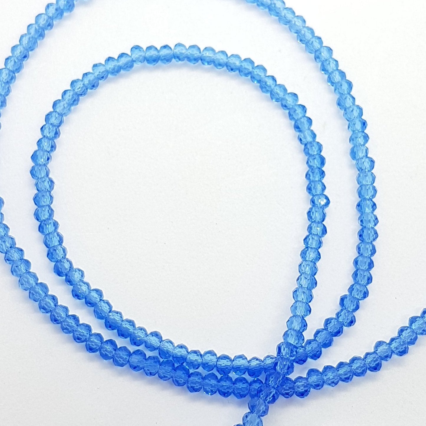 Tiny Blue Crystal Rondelle Beads Approx 200 beads
