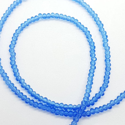 Tiny Blue Crystal Rondelle Beads Approx 200 beads