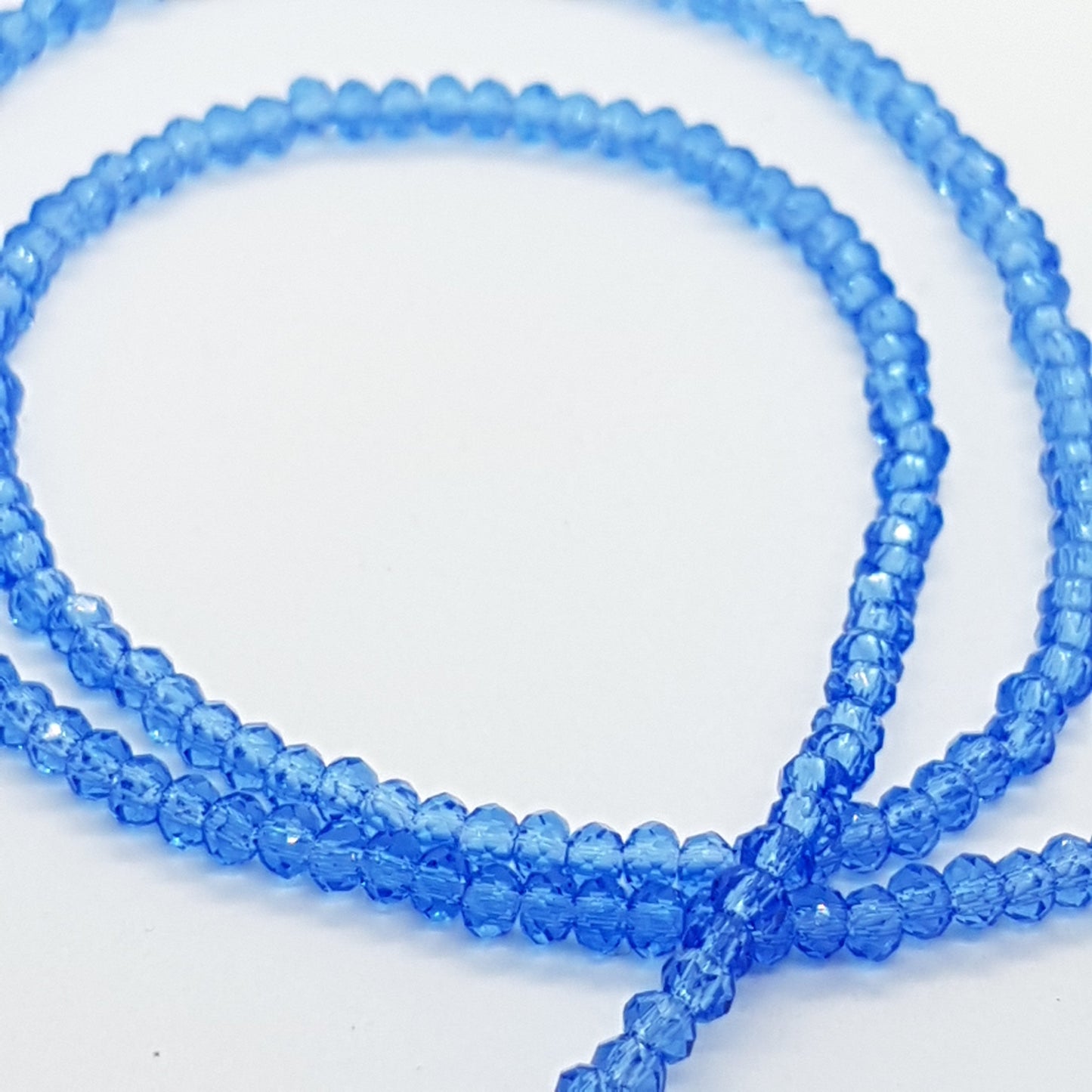 Tiny Blue Crystal Rondelle Beads Approx 200 beads