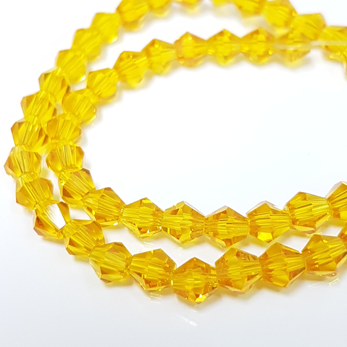 5mm Golden Yellow Glass Bicones