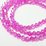 4mm Fuchsia Glass Bicones