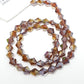 6mm Brown AB Glass Bicones