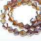 6mm Brown AB Glass Bicones