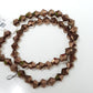 6mm Metallic Brown Glass Bicones