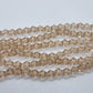 6mm Pale Peach Glass Bicones