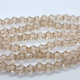 6mm Pale Peach Glass Bicones