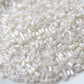 15g Two Cut Off White Seed Beads