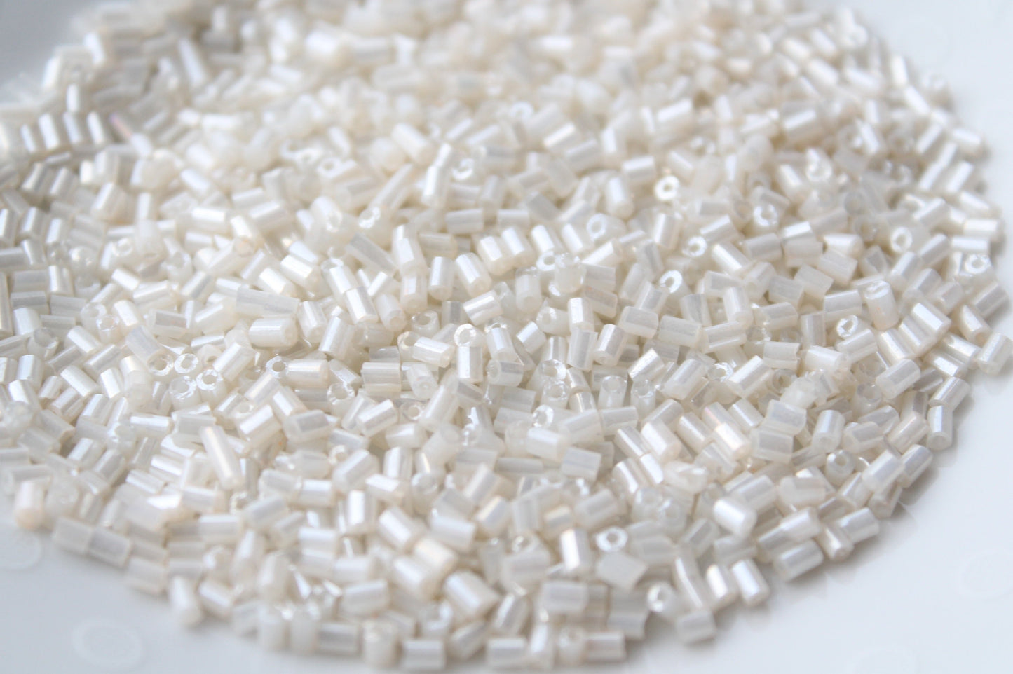 15g Two Cut Off White Seed Beads