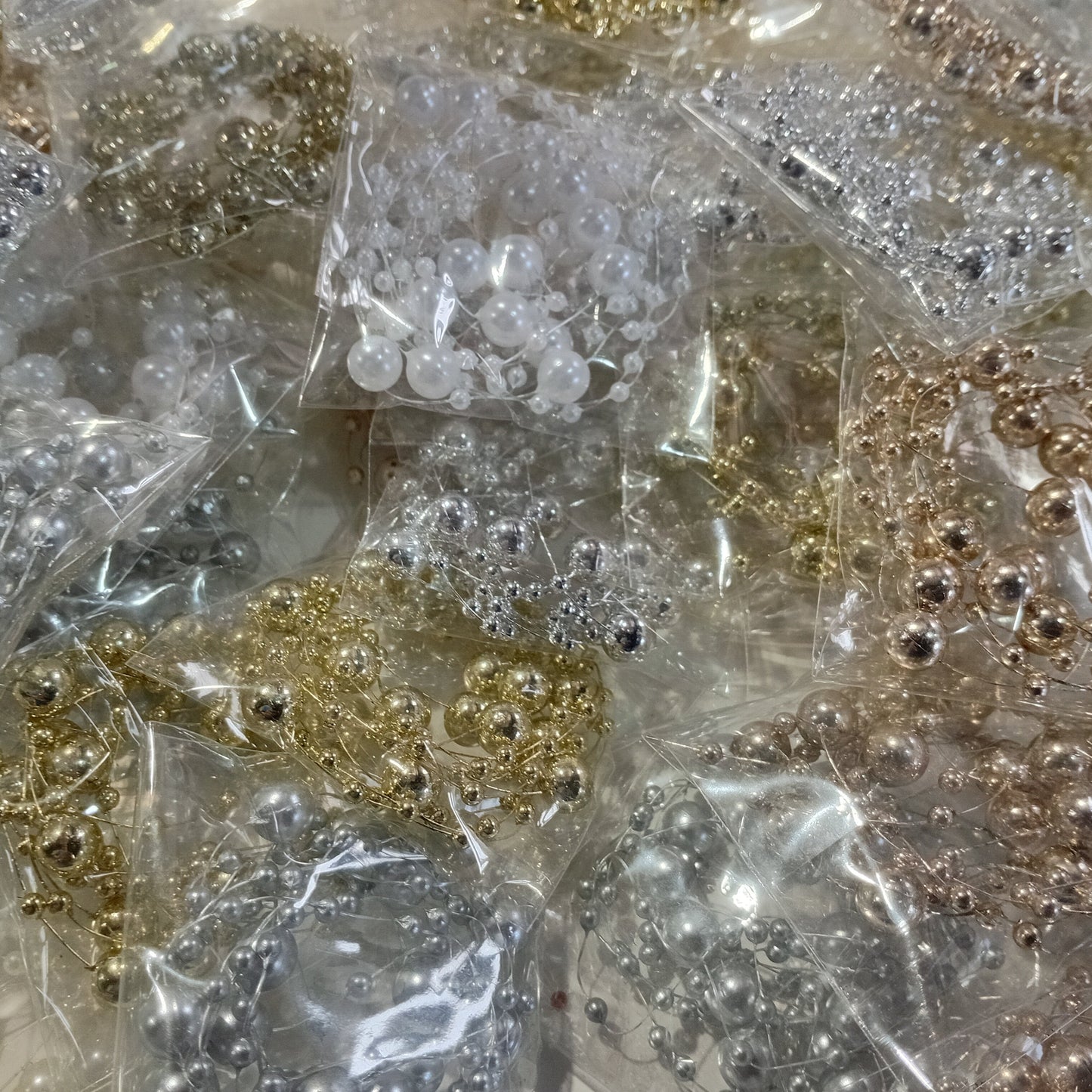 10pc Acrylic Pearl Beads On Nylon Wire.