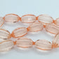20mm Oval Peach Faceted Acrylic Beads