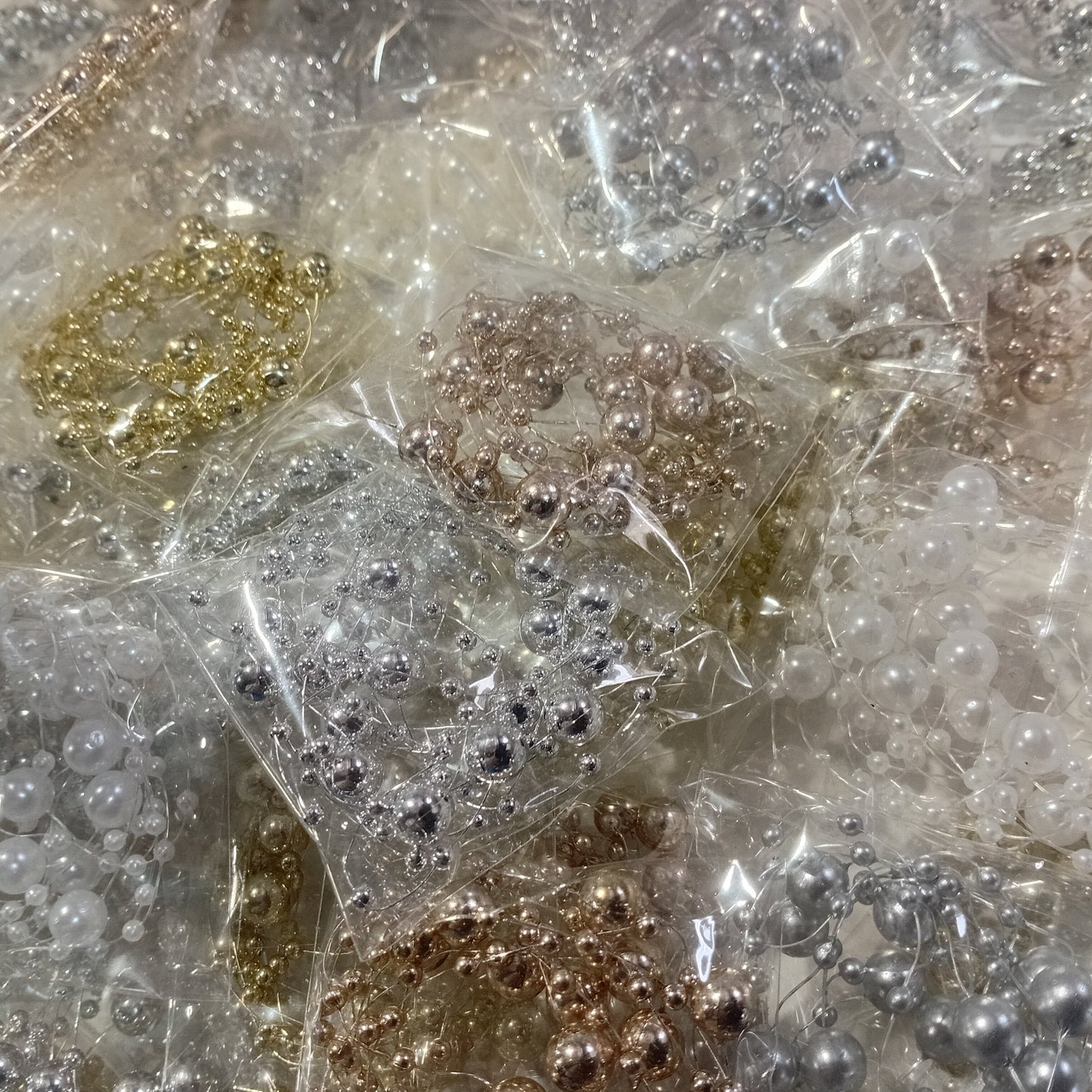 10pc Acrylic Pearl Beads On Nylon Wire.